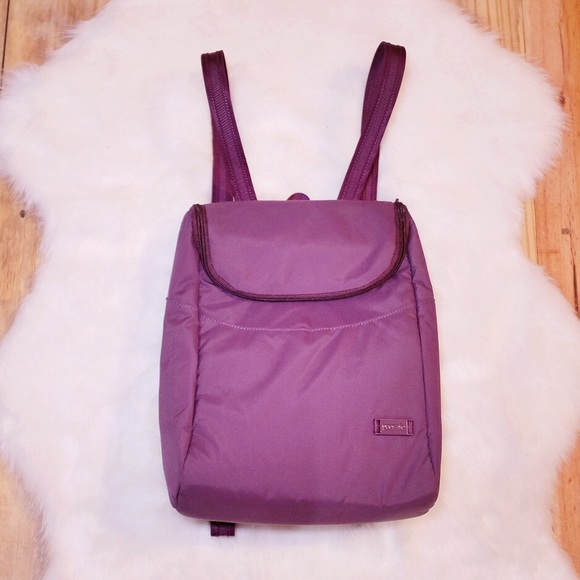 Pacsafe Handbags - NWOT Pacsafe Purple & Blue RFID Small Backpack